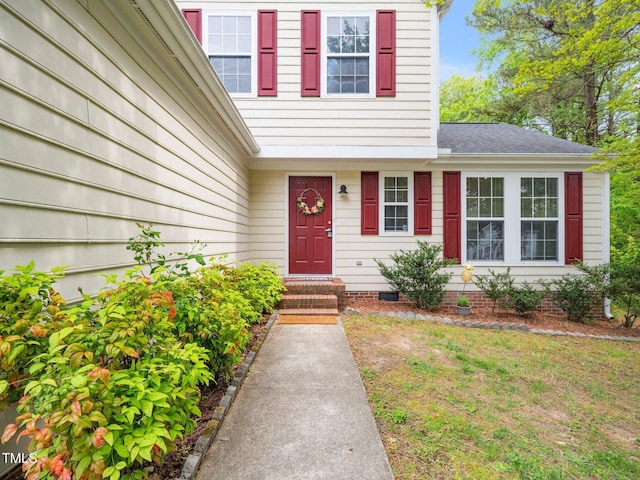 5504 Cumberland Plain Dr, Raleigh, NC 27616 - view of exterior entry with crawl space and a shingled roof