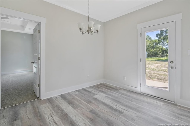 4915 High Branch Ct, Stedman, NC 28391 - unfurnished dining area with a chandelier and wood finished floors