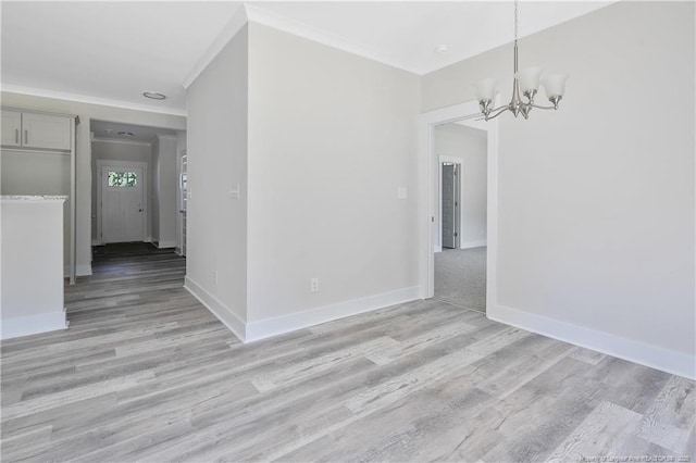 4915 High Branch Ct, Stedman, NC 28391 - unfurnished dining area with a chandelier, light wood-style flooring, and crown molding