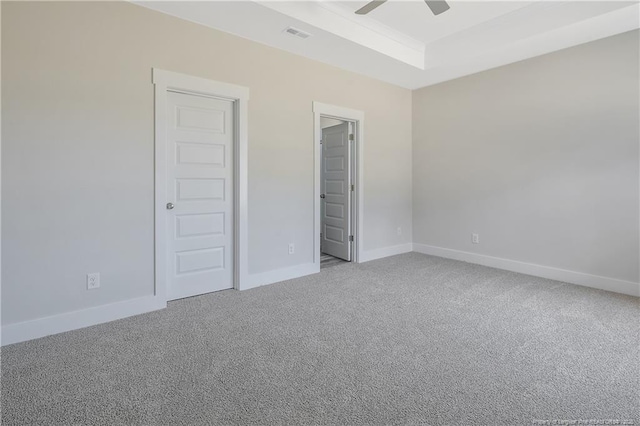 4915 High Branch Ct, Stedman, NC 28391 - unfurnished bedroom with carpet flooring, a tray ceiling, and ceiling fan