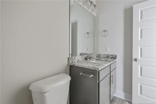 4915 High Branch Ct, Stedman, NC 28391 - half bathroom with vanity and wood finished floors