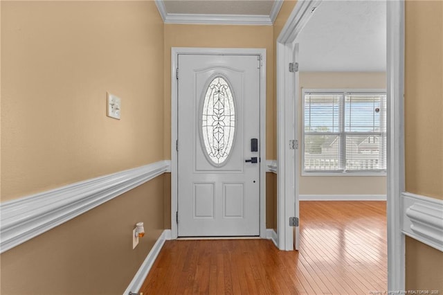 193 Wind Brook Ct, Raeford, NC 28376 - foyer with baseboards, wood finished floors, and crown molding