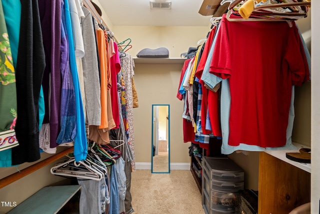 8437 Little Woody Ct, Zebulon, NC 27597 - walk in closet with carpet flooring and visible vents