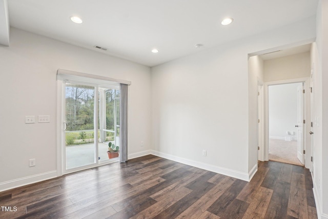 unfurnished room featuring baseboards, visible vents, recessed lighting, and dark wood-style flooring