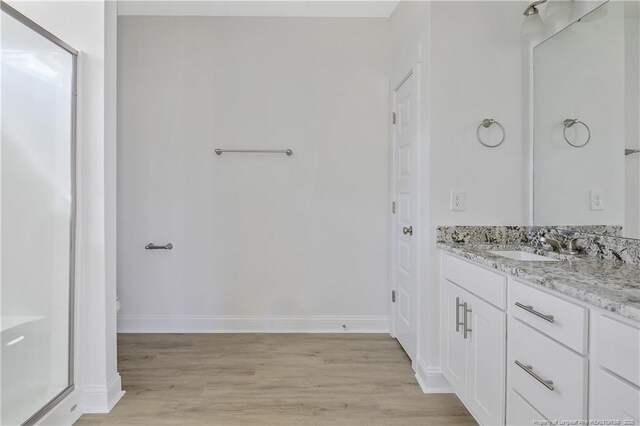 4905 High Branch Ct, Stedman, NC 28391 - bathroom with vanity and wood finished floors