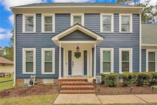 6868 Uppingham Rd, Fayetteville, NC 28306 - colonial home featuring roof with shingles
