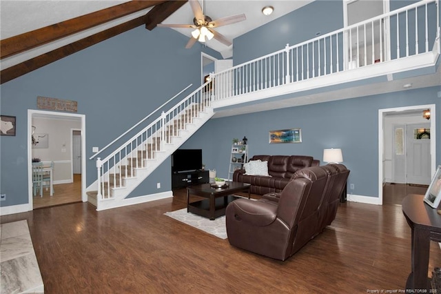 6868 Uppingham Rd, Fayetteville, NC 28306 - living area featuring high vaulted ceiling, ceiling fan, stairway, and beam ceiling