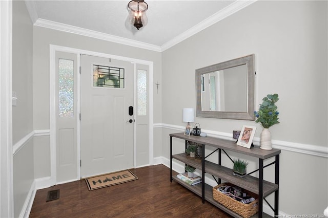 6868 Uppingham Rd, Fayetteville, NC 28306 - foyer entrance with baseboards, ornamental molding, wood finished floors, and visible vents