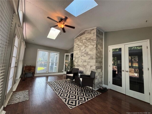 6868 Uppingham Rd, Fayetteville, NC 28306 - office space featuring vaulted ceiling with skylight, ceiling fan, french doors, wood finished floors, and baseboards