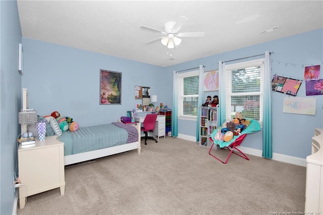 6868 Uppingham Rd, Fayetteville, NC 28306 - carpeted bedroom featuring baseboards, visible vents, and ceiling fan