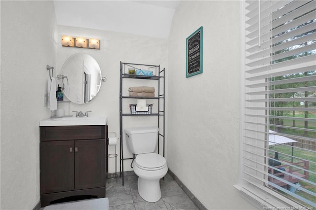 6868 Uppingham Rd, Fayetteville, NC 28306 - bathroom with vanity, baseboards, tile patterned floors, toilet, and a textured wall