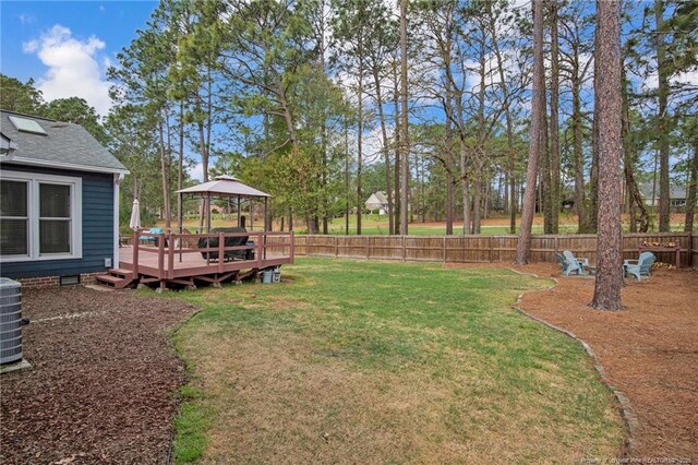 6868 Uppingham Rd, Fayetteville, NC 28306 - view of yard with a fenced backyard, a gazebo, and a deck