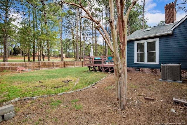 6868 Uppingham Rd, Fayetteville, NC 28306 - view of yard with fence, central AC, and a deck
