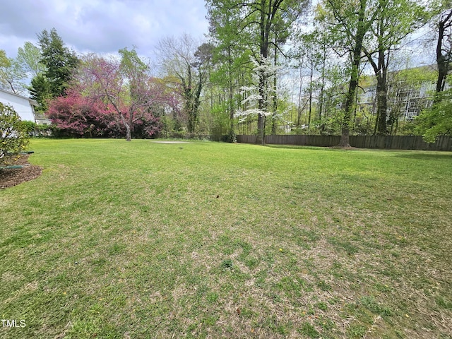 view of yard with fence