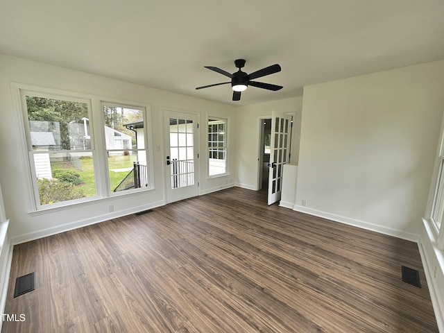unfurnished sunroom with french doors and visible vents
