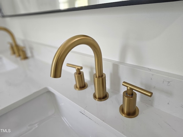interior details featuring a sink
