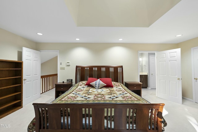 bedroom with recessed lighting, light colored carpet, and baseboards