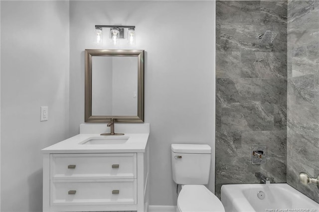 bathroom featuring toilet, vanity, and shower / tub combination