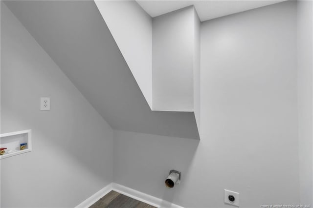 washroom featuring dark wood-style flooring, hookup for a washing machine, baseboards, laundry area, and hookup for an electric dryer