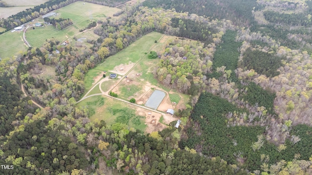 birds eye view of property featuring a rural view