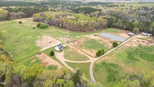 bird's eye view with a rural view and a forest view