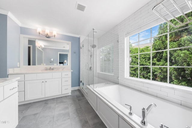 full bathroom featuring plenty of natural light, ornamental molding, a shower stall, vanity, and a bath