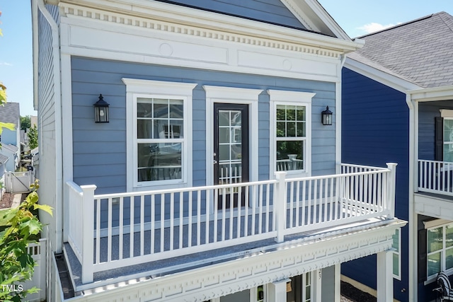 view of home's exterior featuring covered porch