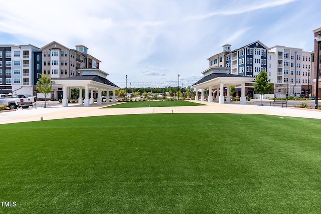 view of home's community with a gazebo and a lawn
