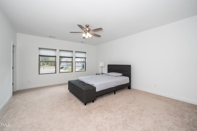 2129 Mars Hill Ln, Apex, NC 27502 - carpeted bedroom featuring ceiling fan, baseboards, and visible vents