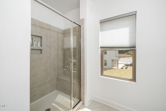 2129 Mars Hill Ln, Apex, NC 27502 - bathroom featuring baseboards and a shower stall