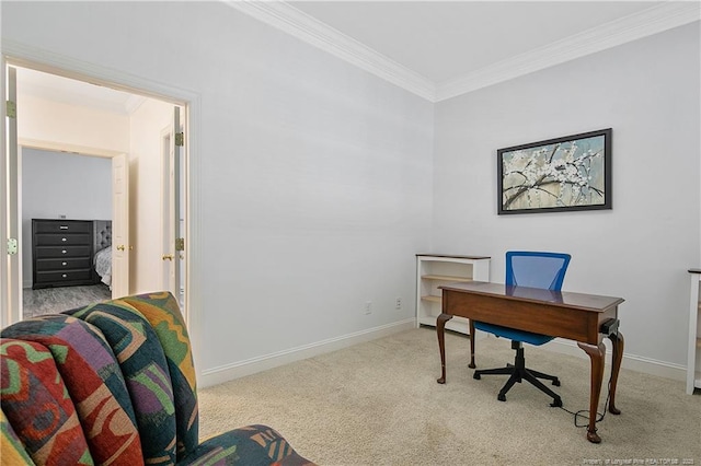 office area with carpet floors, crown molding, and baseboards