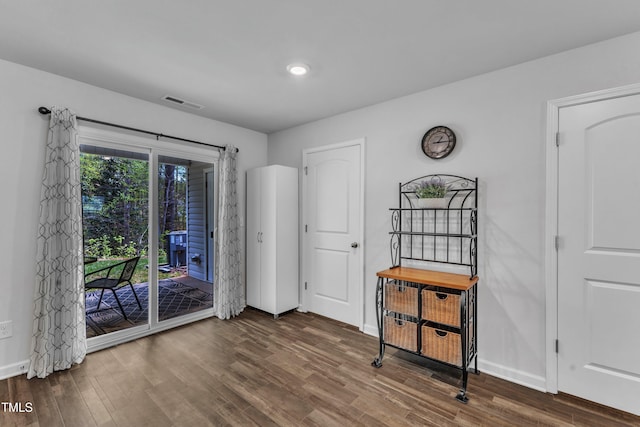 918 E Green St Unit F105, Franklinton, NC 27525 - spare room featuring visible vents, baseboards, wood finished floors, and recessed lighting