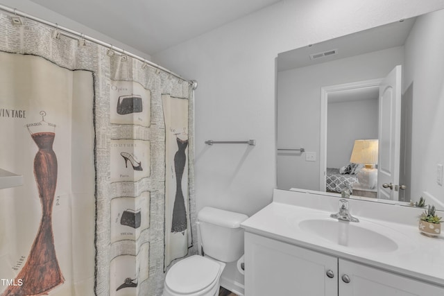 918 E Green St Unit F105, Franklinton, NC 27525 - bathroom featuring toilet, vanity, and visible vents