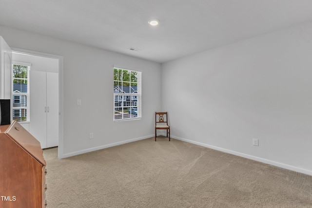 918 E Green St Unit F105, Franklinton, NC 27525 - empty room featuring recessed lighting, visible vents, baseboards, and light carpet