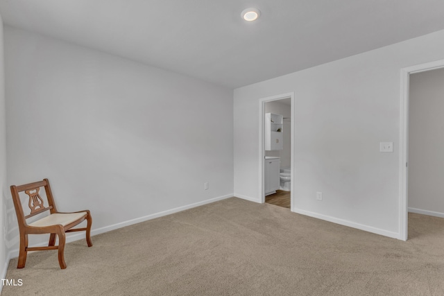 918 E Green St Unit F105, Franklinton, NC 27525 - unfurnished bedroom with ensuite bath, carpet flooring, and baseboards