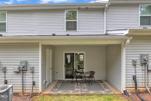 918 E Green St Unit F105, Franklinton, NC 27525 - back of property featuring cooling unit and a patio