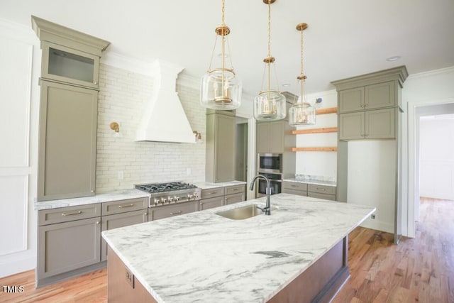 1212 Perry Bluff Dr, Wake Forest, NC 27587 - kitchen featuring appliances with stainless steel finishes, custom range hood, gray cabinets, crown molding, and light wood-style flooring