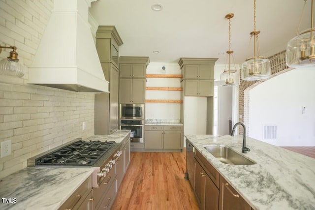 1212 Perry Bluff Dr, Wake Forest, NC 27587 - kitchen featuring appliances with stainless steel finishes, premium range hood, open shelves, backsplash, and light wood-type flooring