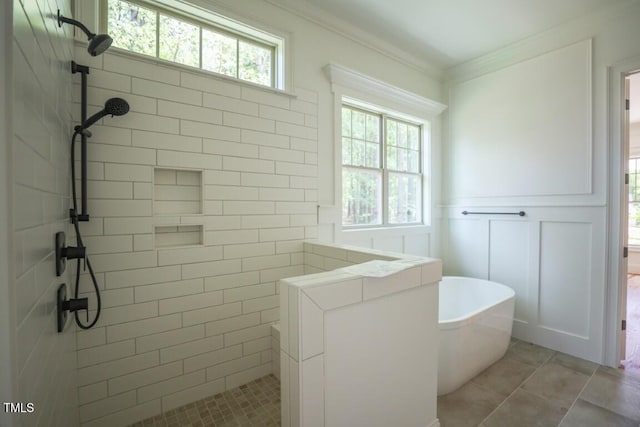 1212 Perry Bluff Dr, Wake Forest, NC 27587 - full bath featuring a tile shower, a freestanding bath, crown molding, a decorative wall, and tile patterned flooring