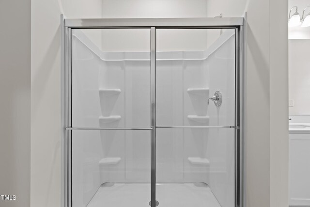 825 Kenyon Spring Dr, Zebulon, NC 27597 - bathroom with a sink and a shower stall