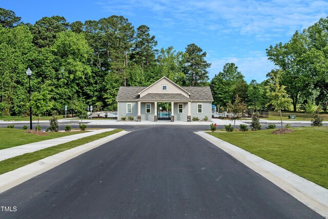 825 Kenyon Spring Dr, Zebulon, NC 27597 - view of road with street lights