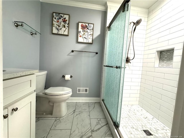 bathroom with marble finish floor, ornamental molding, a stall shower, and baseboards
