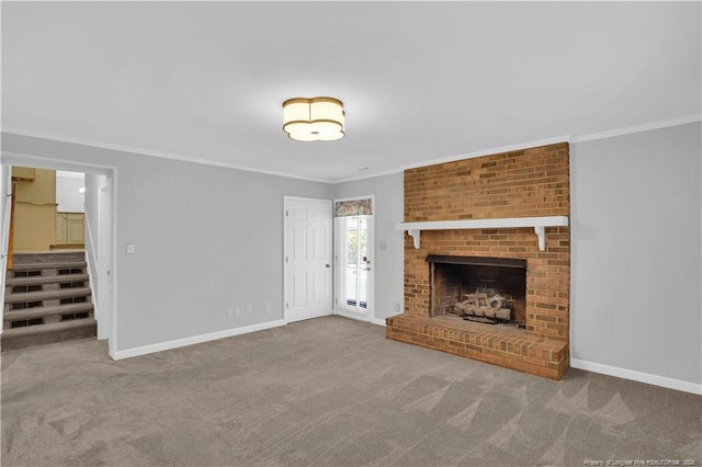 unfurnished living room featuring carpet flooring, crown molding, stairway, and baseboards