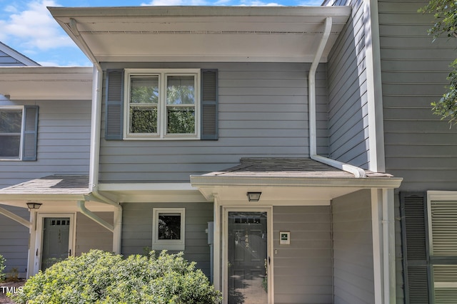 1442 Barton Place Dr, Raleigh, NC 27608 - property entrance with a shingled roof