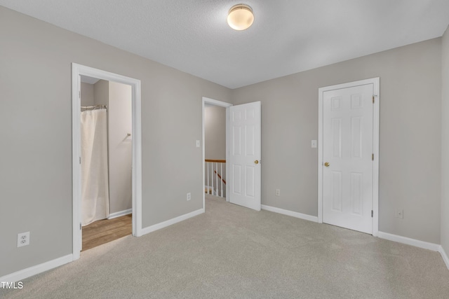 1442 Barton Place Dr, Raleigh, NC 27608 - unfurnished bedroom with baseboards and carpet floors