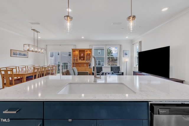 kitchen featuring ornamental molding, light stone counters, open floor plan, stainless steel dishwasher, and a sink