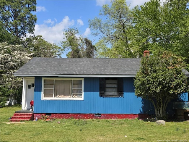 3810 Hanna St, Fayetteville, NC 28304 - view of front of home with crawl space, a shingled roof, and a front lawn