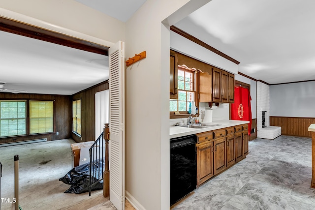 1500 Lakeside Dr, Garner, NC 27529 - kitchen with dishwasher, wood walls, open floor plan, light countertops, and baseboard heating