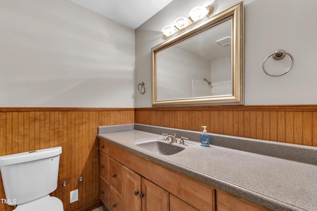 1500 Lakeside Dr, Garner, NC 27529 - bathroom featuring a wainscoted wall, vanity, and wood walls