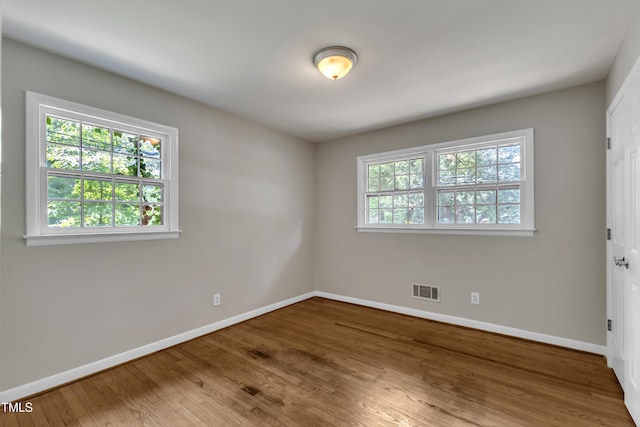 1500 Lakeside Dr, Garner, NC 27529 - unfurnished room with baseboards and wood finished floors